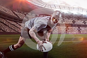 Composite image of determined sportsman looking away while playing rugby with 3d