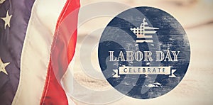 Composite image of digital composite image of celebrate labor day text with american flag on blue po