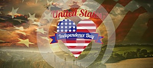 Composite image of digitally generated image of heart shape with independence day text