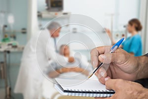 Composite image of doctor checking patient with stethoscope