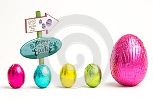 Composite image of easter egg hunt sign
