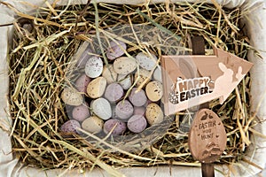 Composite image of easter egg hunt sign