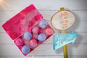 Composite image of easter egg hunt sign