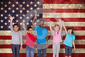 Composite image of elementary pupils smiling and waving