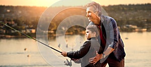 Composite image of father teaching his son fishing