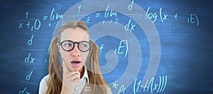 Composite image of female geeky hipster looking confused