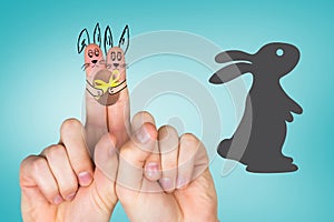 Composite image of fingers as easter bunny