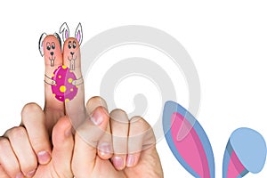 Composite image of fingers as easter bunny
