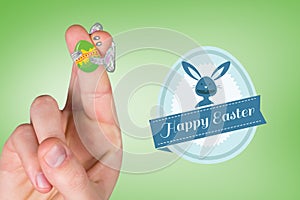 Composite image of fingers as easter bunny