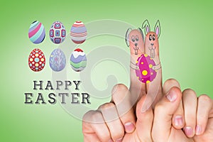 Composite image of fingers as easter bunny