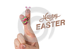 Composite image of fingers as easter bunny
