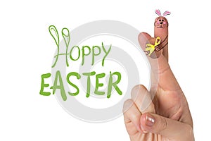Composite image of fingers as easter bunny