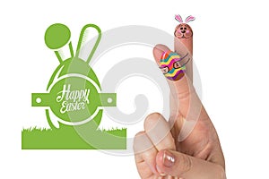 Composite image of fingers as easter bunny