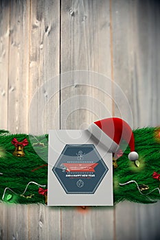 Composite image of fir branch christmas decoration garland