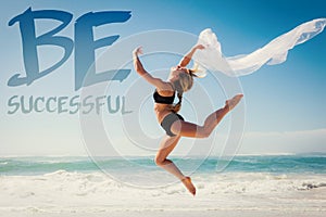 A Composite image of fit blonde jumping gracefully with scarf on the beach