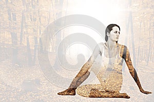 Composite image of fit woman doing the half spinal twist pose in fitness studio