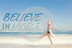 A Composite image of fit woman jumping gracefully on the beach with scarf