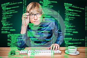 Composite image of focused hipster businessman using computer