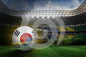 Composite image of football in south korea colours