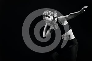 Composite image of front view of sportswoman is practising shot put