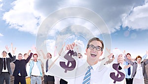 Composite image of geeky happy businessman holding bags of money