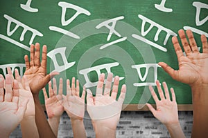 Composite image of hands raising in the air