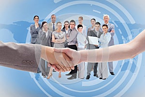 Composite image of handshake between two women