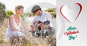 Composite image of handsome man serenading his girlfriend with guitar