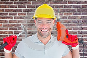 Composite image of happy repairman holding hammer and drill machine