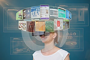 Composite image of happy woman experiencing virtual reality headset 3d