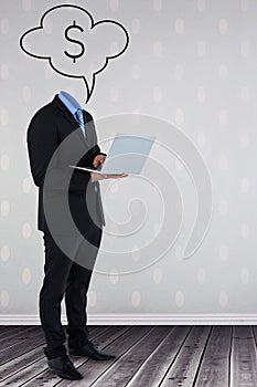 Composite image of headless businessman using laptop