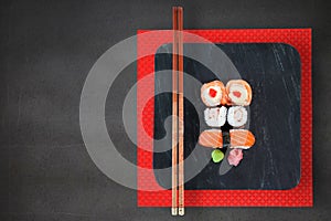 Composite image of high angle view of fresh sushi in plate