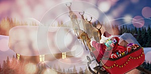 Composite image of high angle view of santa claus riding on sled with gift box