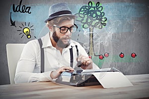 Composite image of hipster holding smoking pipe while working on