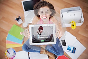 Composite image of login screen with redheaded woman and laptop