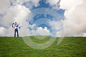 Composite image of man lifting up his girlfriend