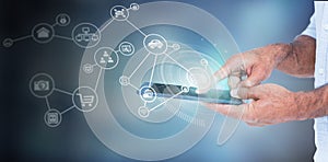 Composite image of a man using tablet computer