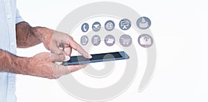 Composite image of a man using tablet computer