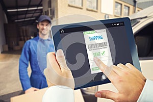 Composite image of man using tablet pc