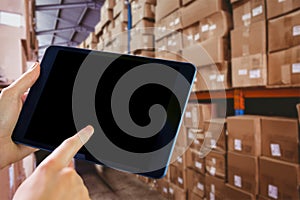 Composite image of man using tablet pc