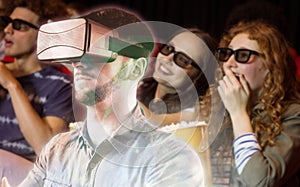 Composite image of man using a virtual reality device