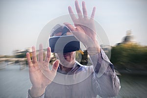 Composite image of man using a virtual reality device