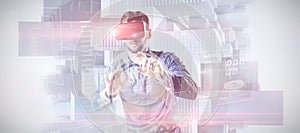 Composite image of man using virtual reality headset