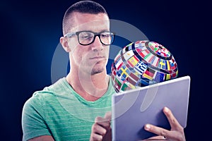 Composite image of man wearing glasses while using tablet computer