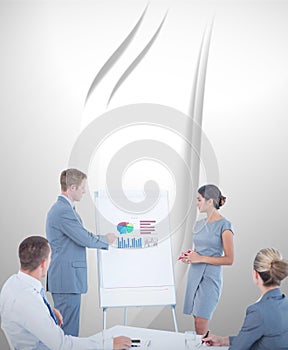 Composite image of manager presenting statistics to his colleagues