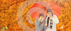 Composite image of mature couple blowing their noses under umbrella
