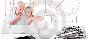 Composite image of mature students using laptop