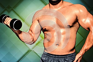 Composite image of mid section of a bodybuilder with dumbbell