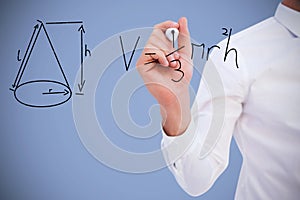 Composite image of mid section of businessman writing with marker