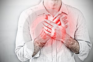 Composite image of mid section of a man with chest pain